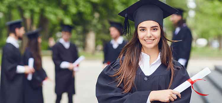female high school graduate holding diploma