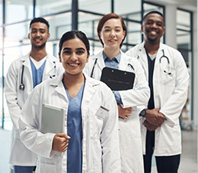 healthcare administrators and public health professionals look at the camera