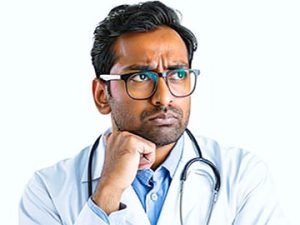 pensive healthcare administrator pondering ethical questions