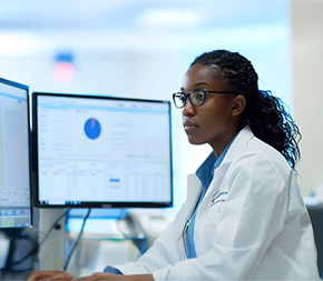 healthcare administrator looks at data files