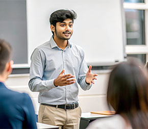 healthcare administration student presents capstone project to class