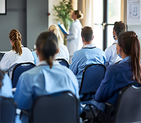 medical billers sitting in training class for continuing education