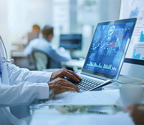 medical biller sourcing data analytics on laptop